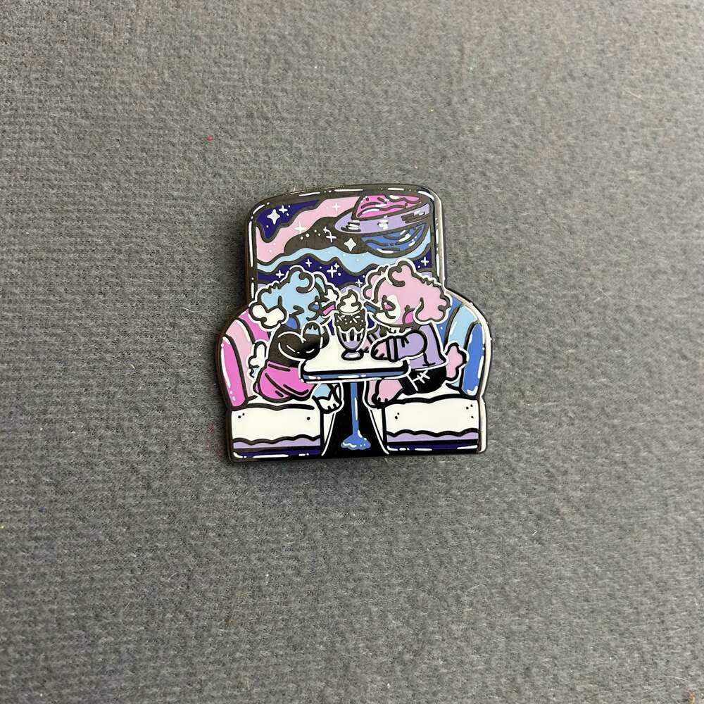 Aesthetic Space Diner Booth Enamel Pin with Cute Creatures Sharing a Milkshake